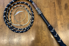 Jonathan Barkei, "Black and Gold Performance Hybrid Whip," 550 Paracord, Brass, PVC, 6 Feet, $250