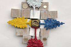 Audrey Jakab, Cardinal Points, Plastic Toy Trees, Mexican Craft Eye in Metal, Buttons, Mulberry Paper, Paint, Wooden Toy Blocks